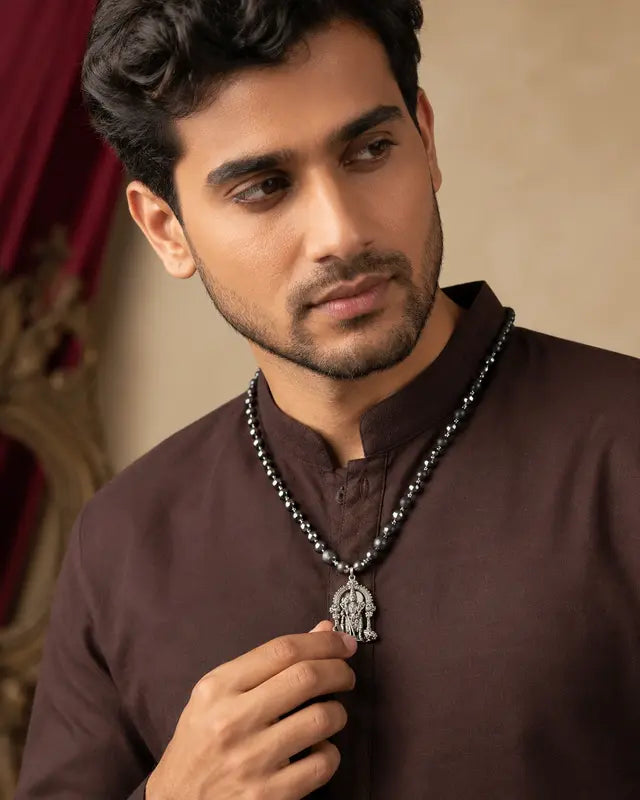 Male model wearing original hematite spiritual necklace