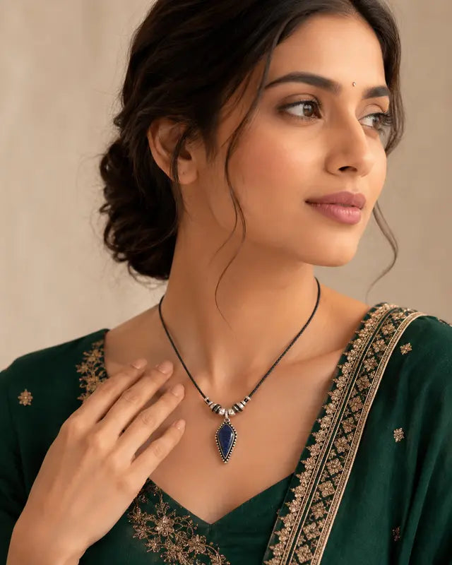 Female model wearing original blue gemstone pendant